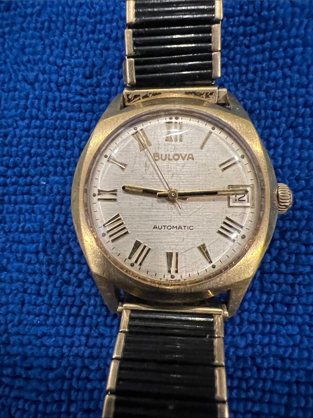 Bulova Gold and Silver Tone Watch with Black Bracelet